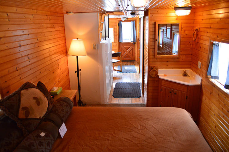 Bedroom in Green Caboose - Cabin Rentals in Glacier