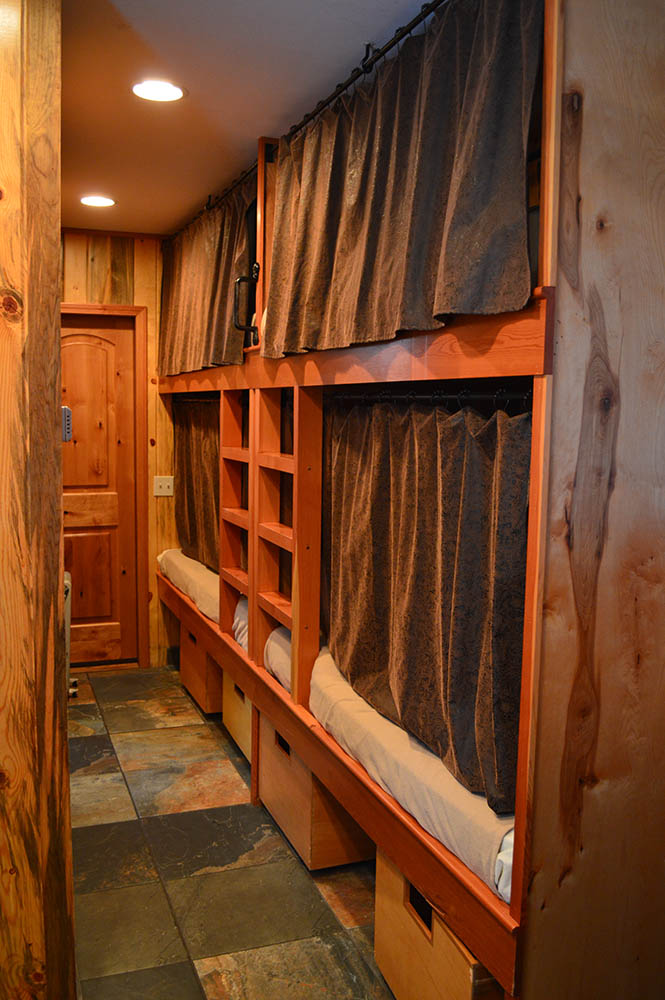 4 bunks in northern caboose located at Izaak Walton Inn - Luxury Cabins Near Glacier National Park
