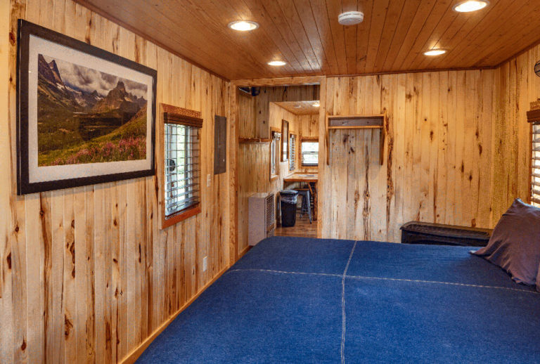 Bedroom of luxury red caboose - Cabin Rentals in Glacier