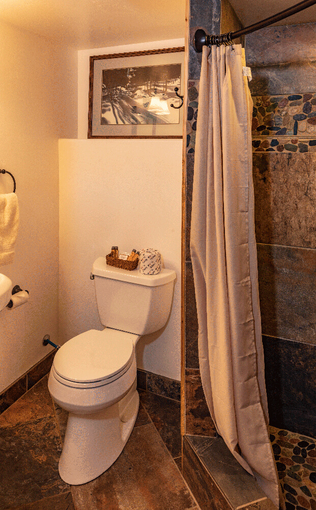 Bathroom in luxury red caboose - Cabin Rentals in Glacier
