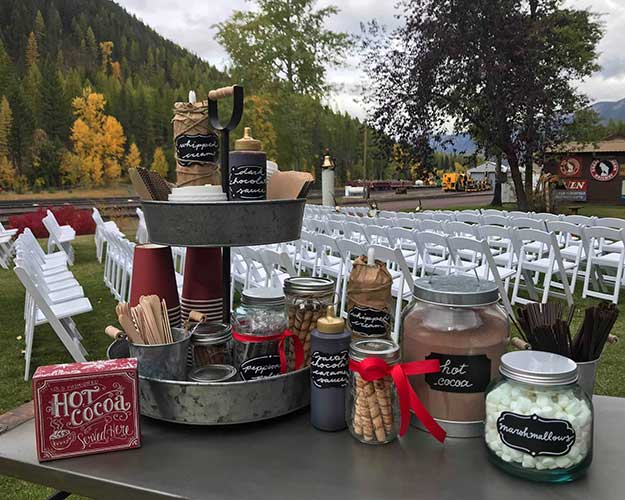 Outdoor wedding ceremony welcome table- Glacier National Park Wedding Venues